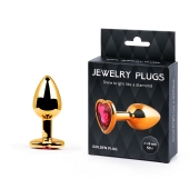 Золотистая анальная пробка с малиновым кристаллом-сердечком - 7 см. - Anal Jewelry Plug - купить с доставкой в Калининграде